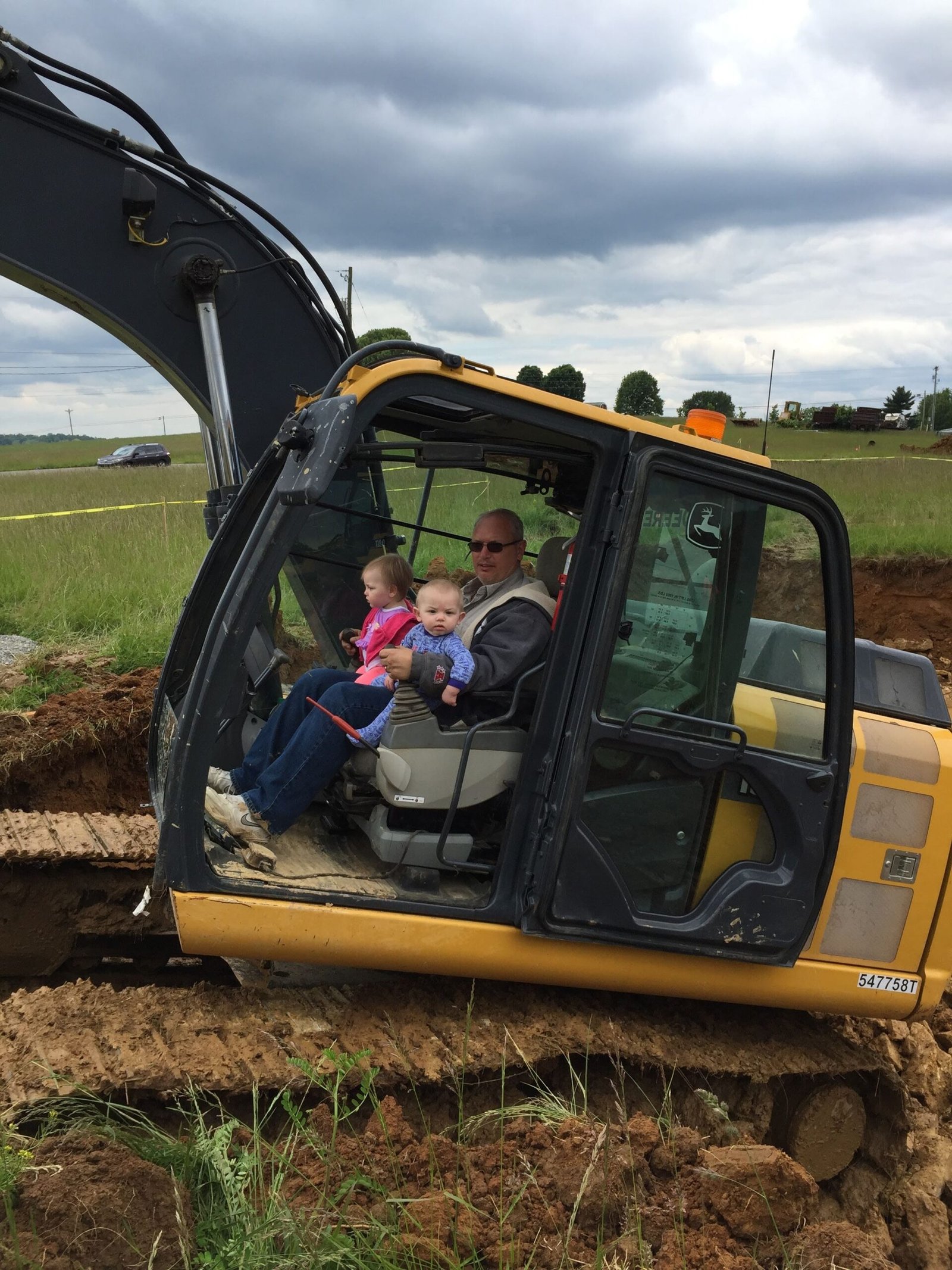 George the Electrician with family and equipment